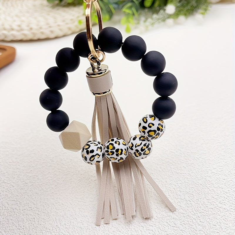 1pc Stylish Leopard Pattern Silicone Wooden Beaded Wristlet Keychain - Fashionable PU Leather Tassel Bag Charm, Phone Lanyard, Bangle Keychain for Women's Daily Use - Perfect Gift for Friends and Family