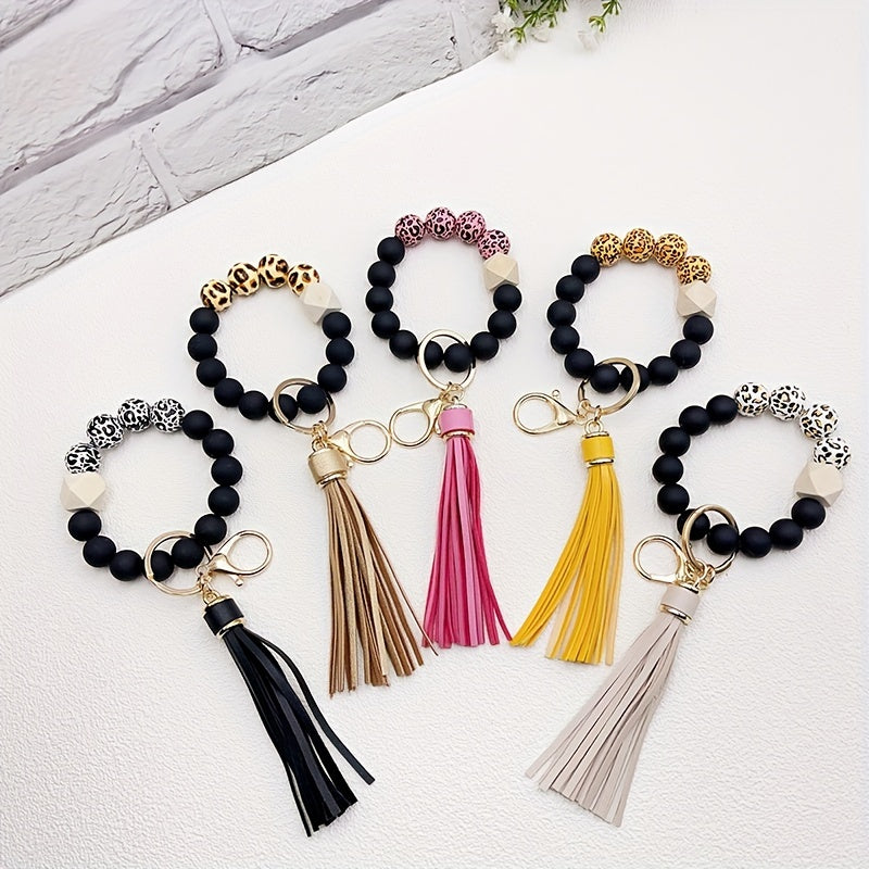 1pc Stylish Leopard Pattern Silicone Wooden Beaded Wristlet Keychain - Fashionable PU Leather Tassel Bag Charm, Phone Lanyard, Bangle Keychain for Women's Daily Use - Perfect Gift for Friends and Family