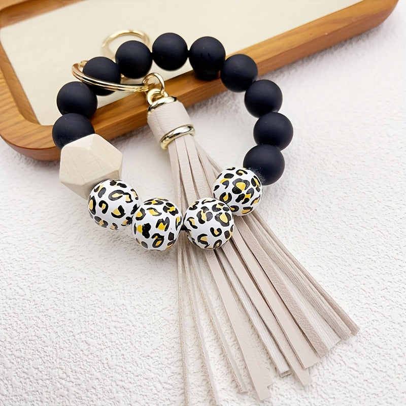 1pc Stylish Leopard Pattern Silicone Wooden Beaded Wristlet Keychain - Fashionable PU Leather Tassel Bag Charm, Phone Lanyard, Bangle Keychain for Women's Daily Use - Perfect Gift for Friends and Family