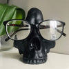 1pc Gothic Skull Glasses Holders, Skull Statues Eyewear Stand Crafts Tabletop Desktop Ornament, For Home Office Room Decor Birthday Halloween (4.8*5.6*5.6in), Day Of The Dead Decor