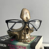 1pc Gothic Skull Glasses Holders, Skull Statues Eyewear Stand Crafts Tabletop Desktop Ornament, For Home Office Room Decor Birthday Halloween (4.8*5.6*5.6in), Day Of The Dead Decor