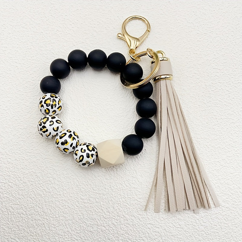 1pc Stylish Leopard Pattern Silicone Wooden Beaded Wristlet Keychain - Fashionable PU Leather Tassel Bag Charm, Phone Lanyard, Bangle Keychain for Women's Daily Use - Perfect Gift for Friends and Family