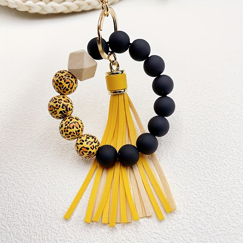 1pc Stylish Leopard Pattern Silicone Wooden Beaded Wristlet Keychain - Fashionable PU Leather Tassel Bag Charm, Phone Lanyard, Bangle Keychain for Women's Daily Use - Perfect Gift for Friends and Family